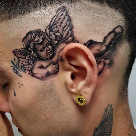 angel whispering in ear neck tattoo|Top 10 angel whispering tattoo ideas and inspiration